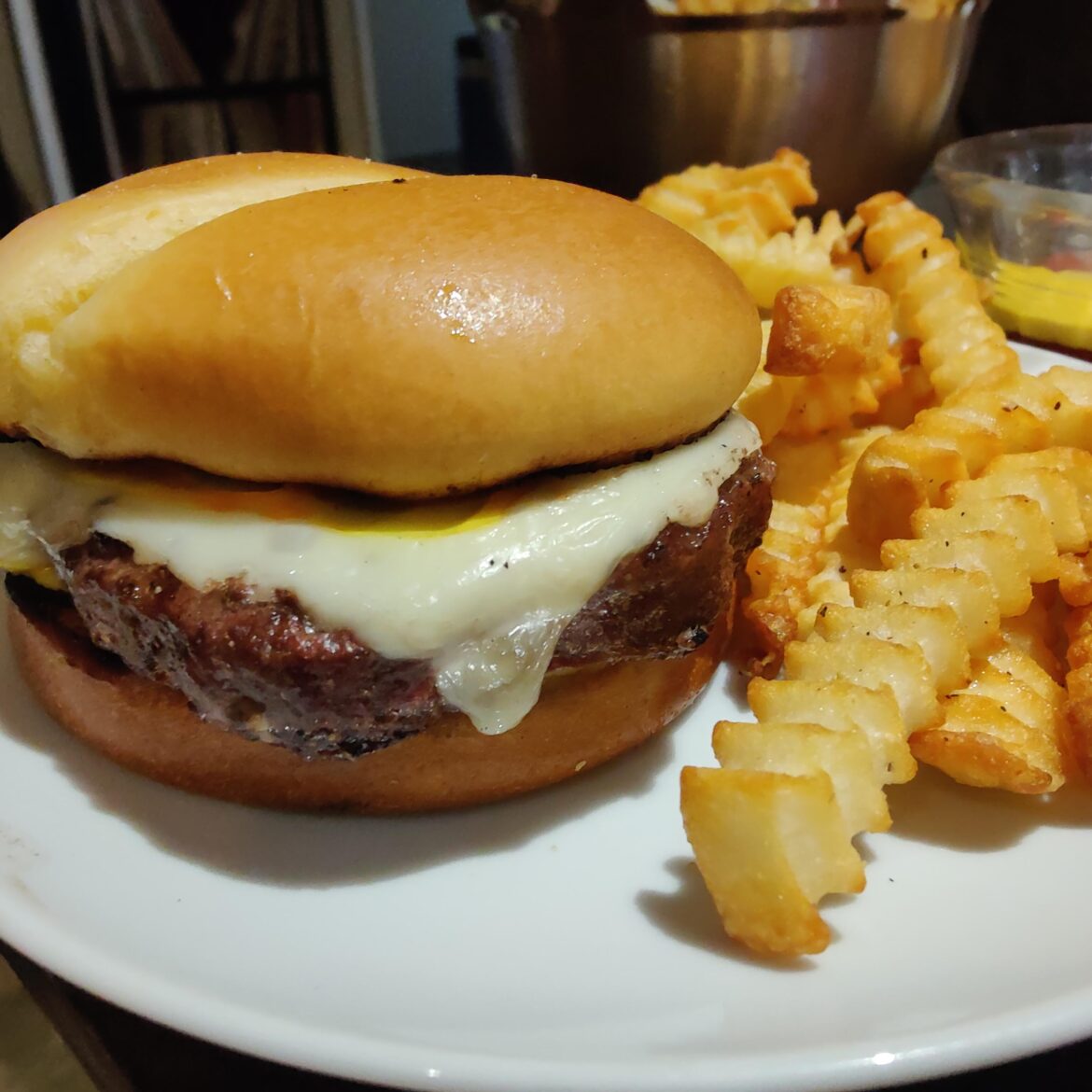 Failed to plan for dinner tonight .. so grilled up a frozen patty and air fried some crinkle cuts. I feel so dirty.