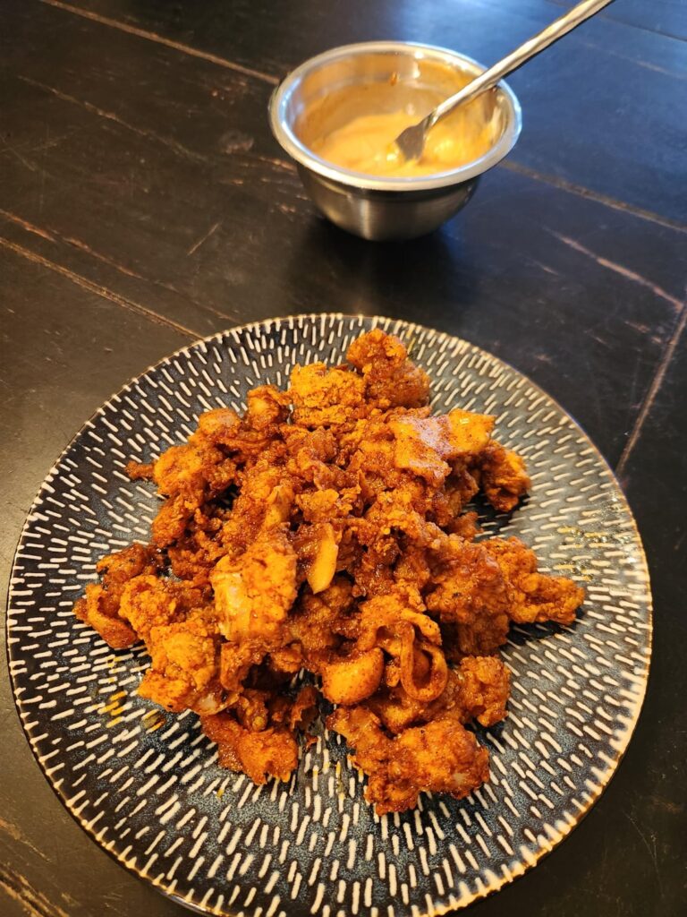 Nashville style spicy clam strips.