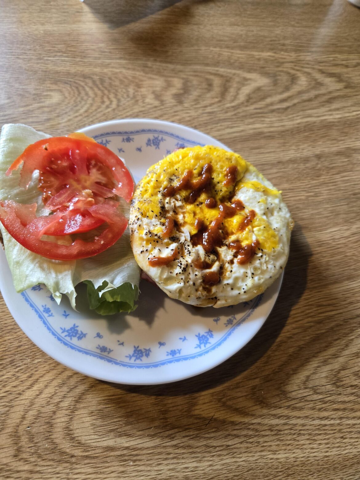Ham, egg and cheese on an English muffin