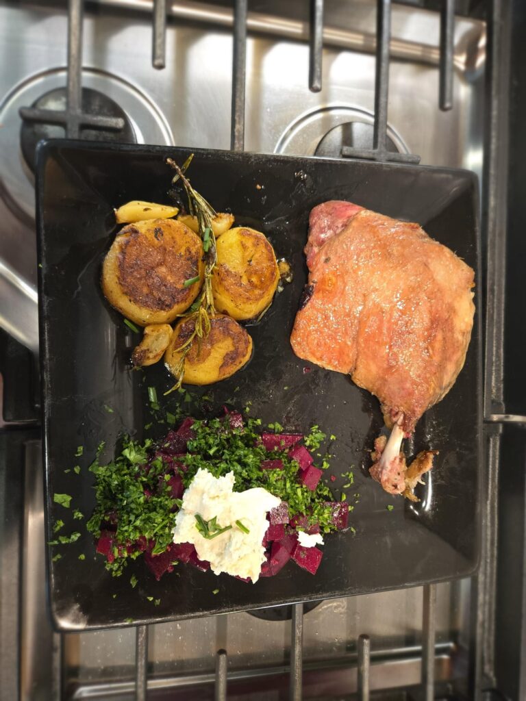 Duck confit (Serious Eats recipe), Duck fat fondant potatoes, and beet salad with whipped goat cheese.