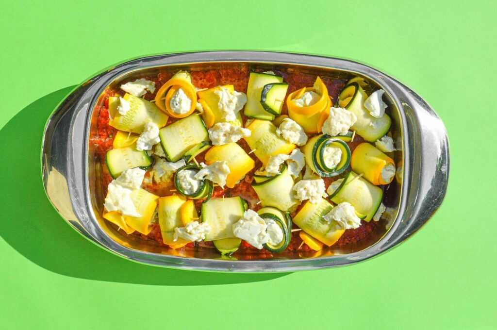 Involtini di zucchine con ricotta e menta - zucchini rolls stuffed with ricotta, mint & lemon zest baked in a tomato and basil sauce