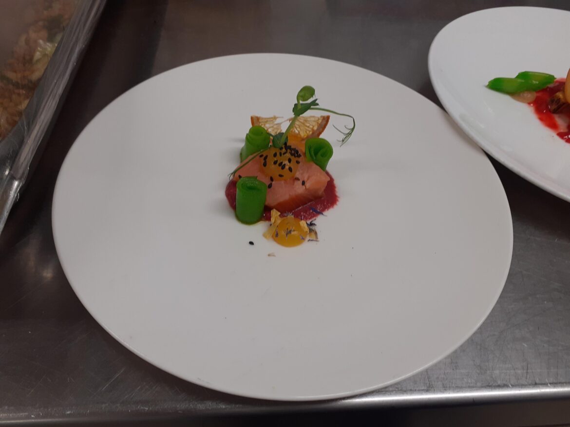 Cured salmon, mango gel, beetroot puree and pickled cucumber