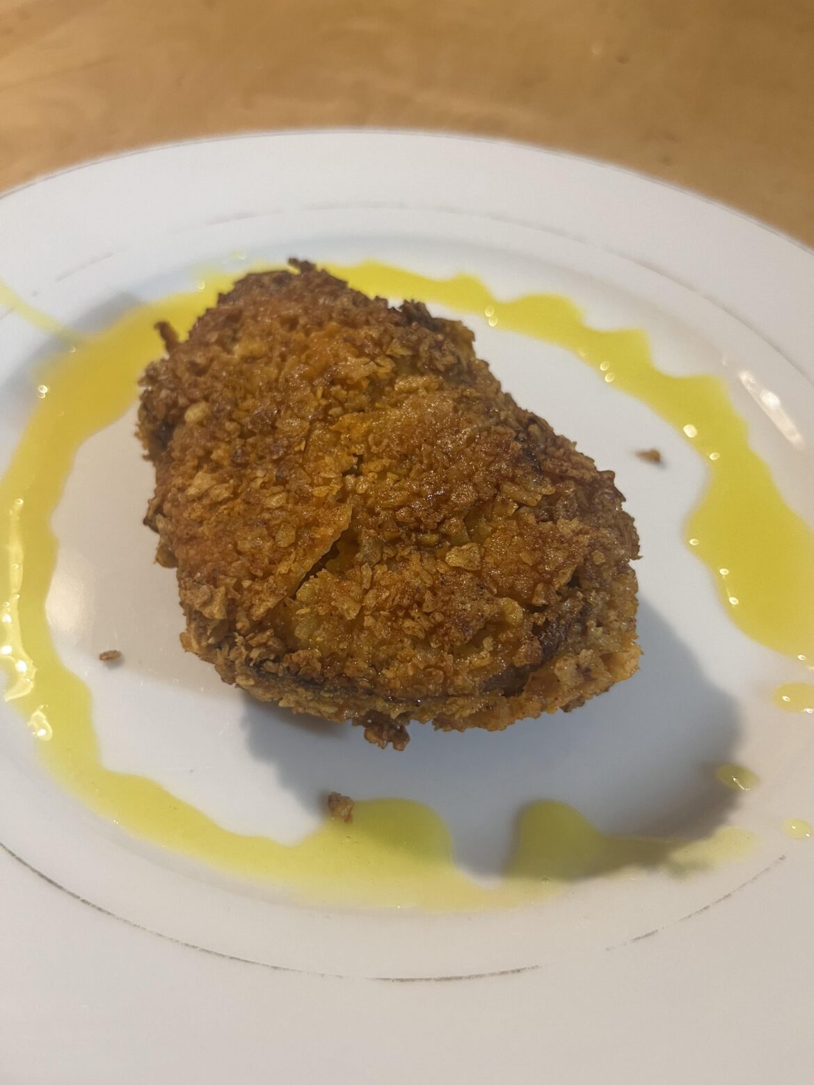 A Doritos encrusted sirloin, garnished with a Mountain Dew reduction.