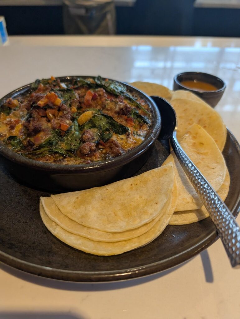 Chorizo Fundido w/ Habanero Salsa and Mayan Chamorro.