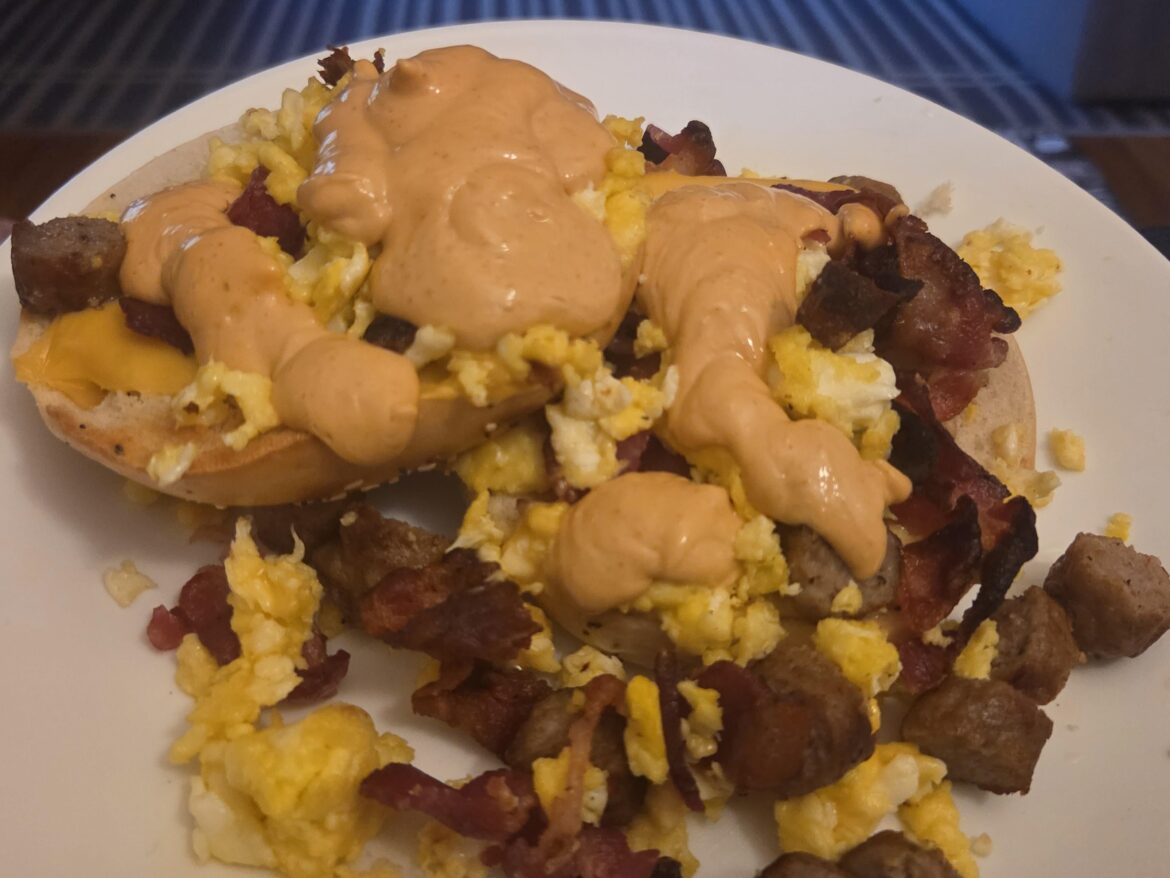 I call it "kids leftovers slapped on a bagel with too much sauce".