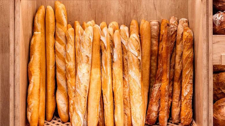 Overhead view of baguettes in box