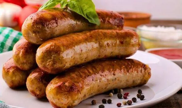 Picture of sausages on a plate with fennel seeds