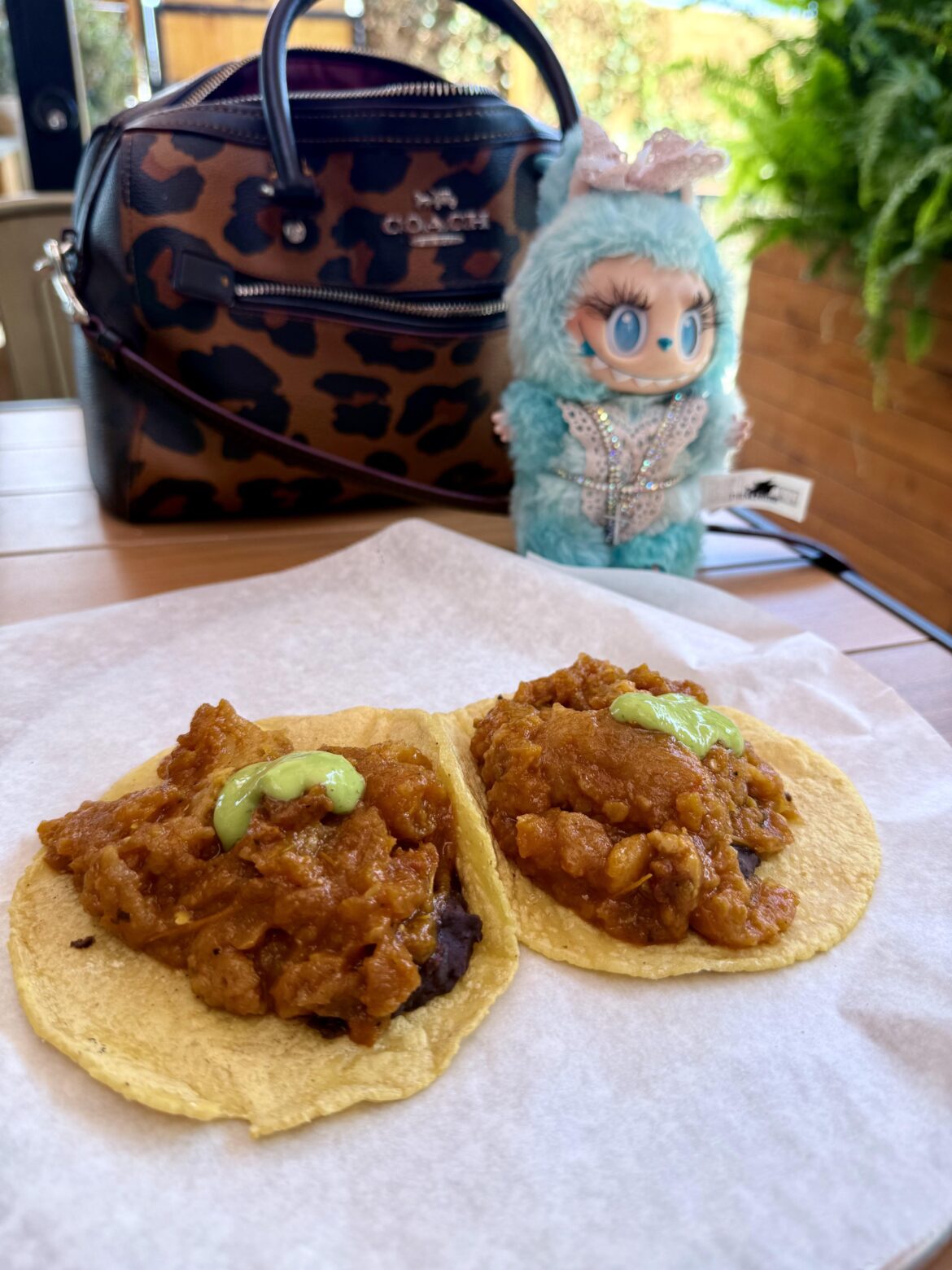 Guisados always in LA. Chicarrón tacos & my Labubu