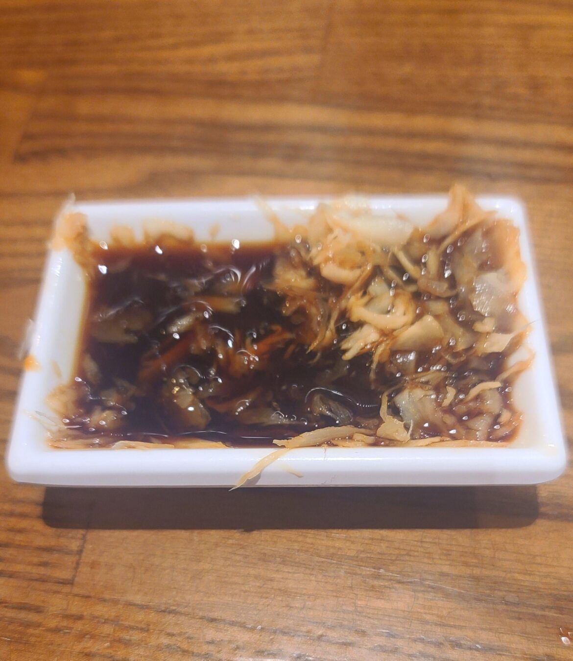 My friend will take ginger, shred it with his chopsticks, then add soy sauce. Does anyone else do this?