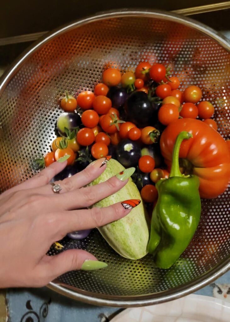 Wife sent me a pic of yoday's harvest - and her matching nails 🐛
