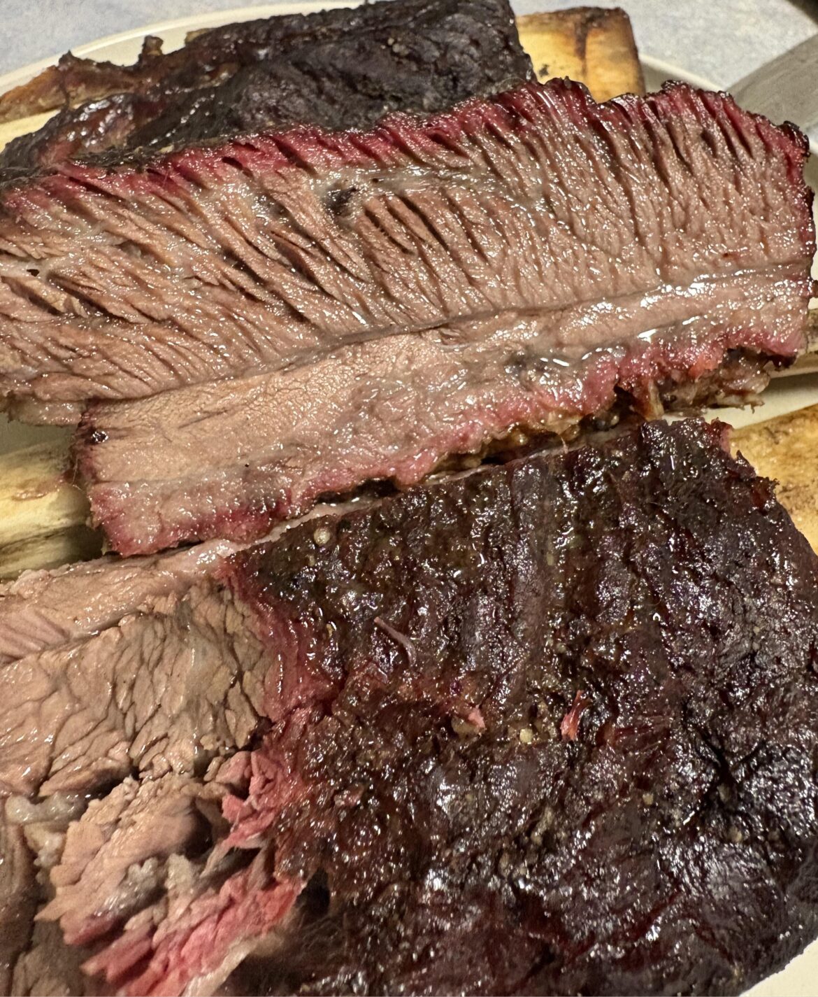 First crack at beef ribs on the weber kettle, smoked with plum wood
