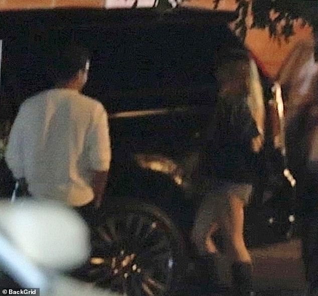 When they left the trendy establishment together they got into a black SUV