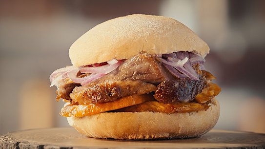Pan con chicharron … a pork sandwich with slices of sweet potato and salsa criolla.