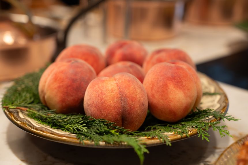 Peaches at Sugalabo, Tokyo. Chef Yosuke Suga explains the restaurant sources its peaches in a hyper-seasonal fashion, using a each variety for one week only for maximum ripeness.