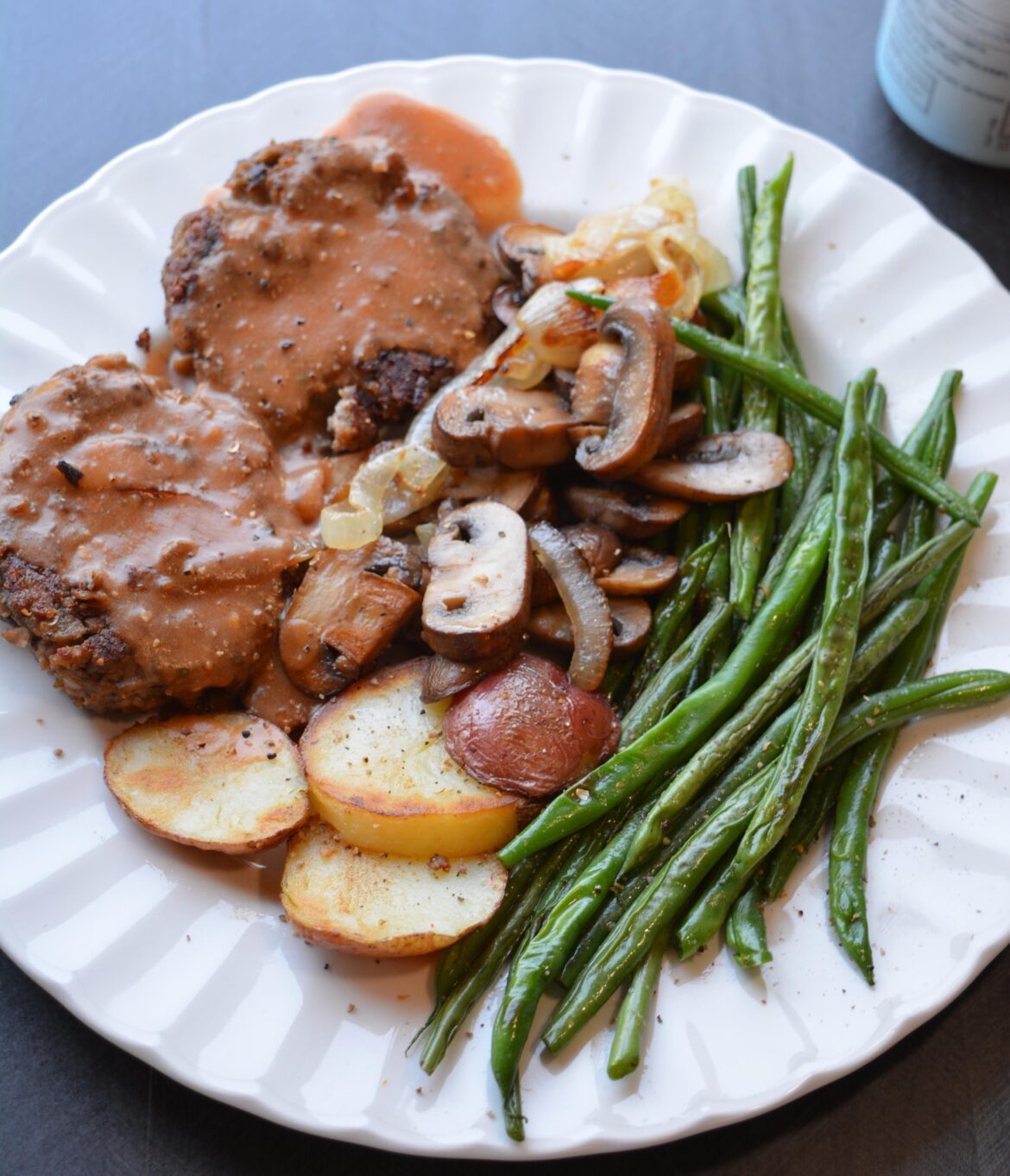 vegan Salisbury steak dinner (389 cal, 27 g protein). Surprisingly easy to make, but really filling. vegan Salisbury steak dinner (389 cal, 27 g protein). Surprisingly easy to make, but really filling.