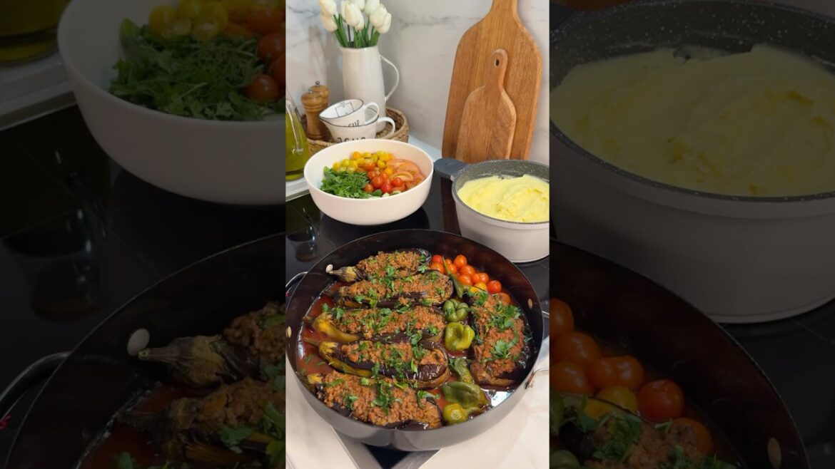 Stuffed eggplant with ground beef baked in tomato sauce, mashed potatoes and salad #food #shorts