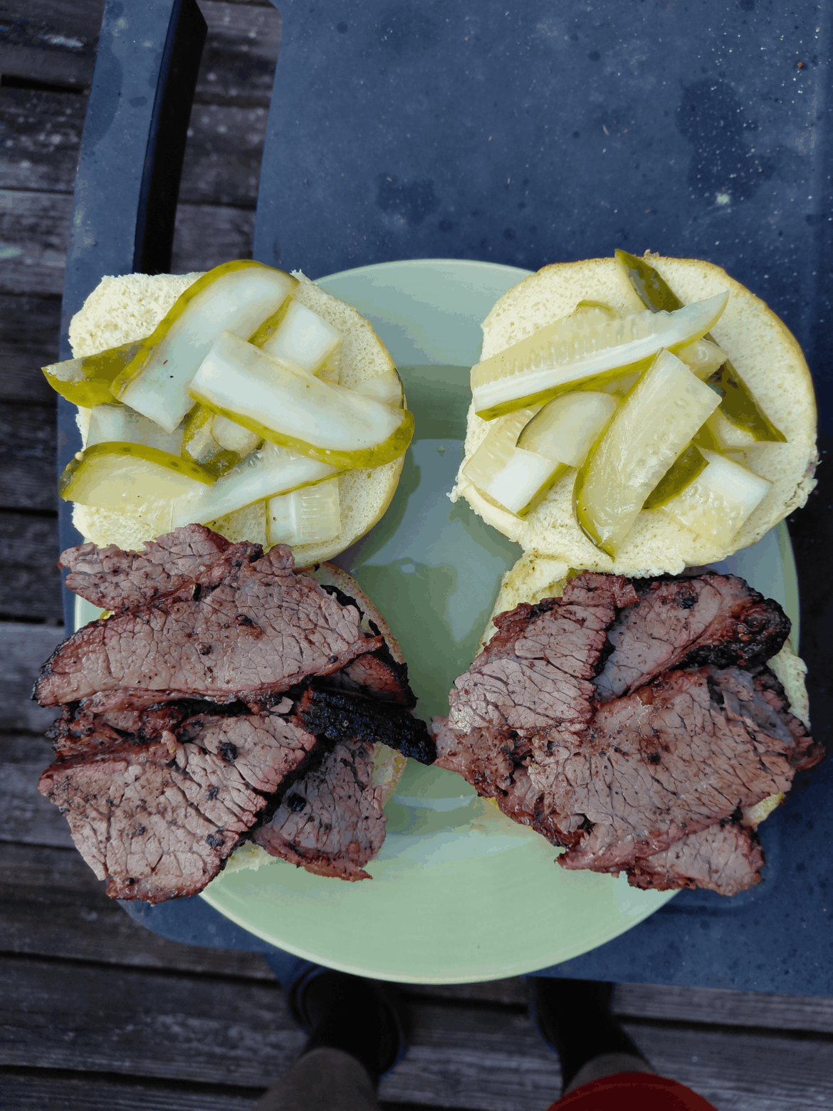 Two very groovy sandwiches. Homemade pickles on brioche