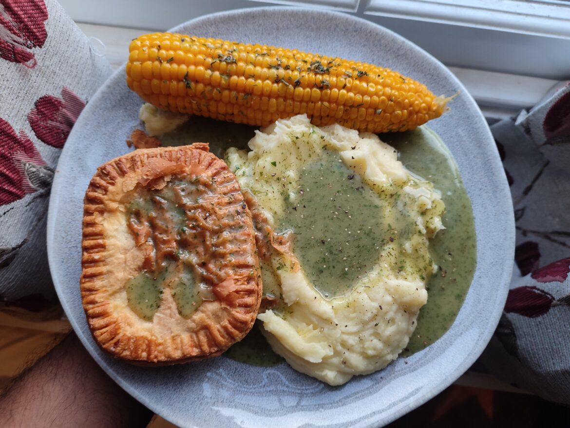 Minced beef and onion pie, mash and home liquor
