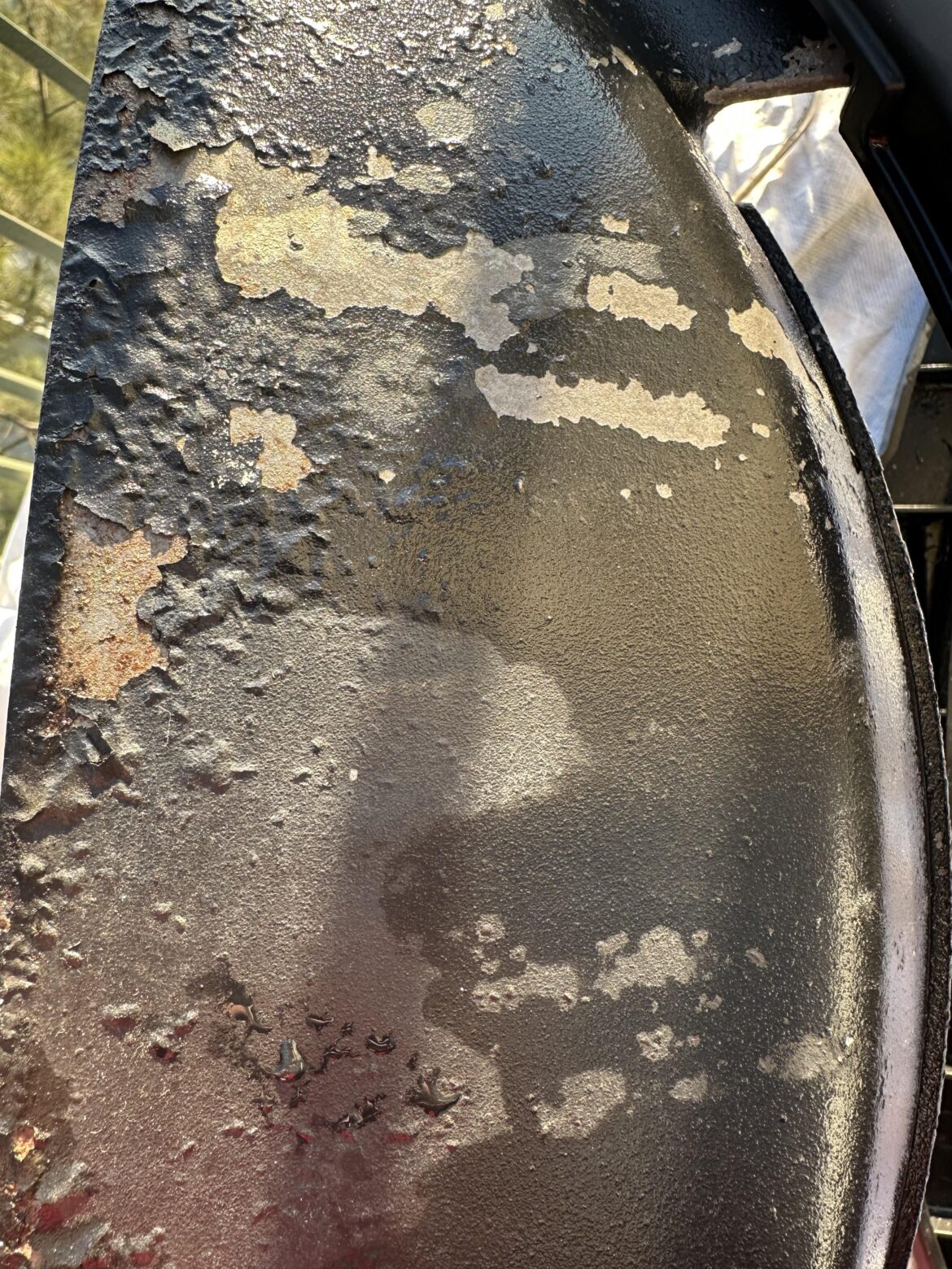 Paint peeling on Weber Q Paint peeling on Weber Q