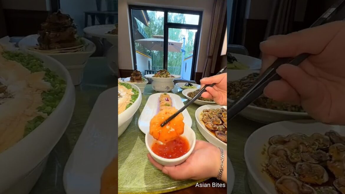 Fresh seafood,savory clams,spicy grilled squid-Qingdao’s flavors burst with coastal charm,tradition. Fresh seafood,savory clams,spicy grilled squid-Qingdao's flavors burst with coastal charm,tradition.