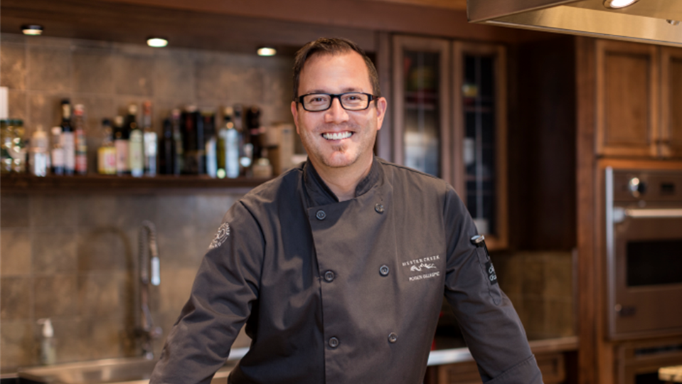 Roger Gillespie, Director of Operations at Hester Creek Estate Winery, smiling in a kitchen.