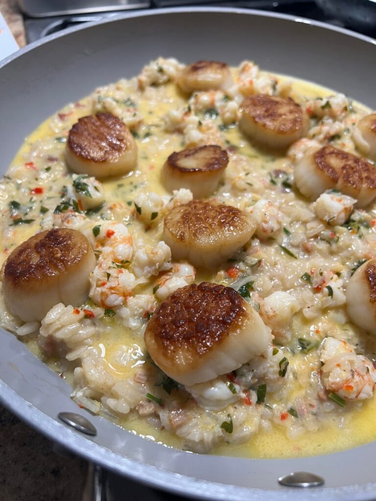 [homemade] Seared Scallops and Shrimp in lemon butter sauce over pancetta risotto
