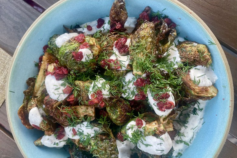 Crispy Brussels with coriander seed yogurt and Haydari dill barberries.