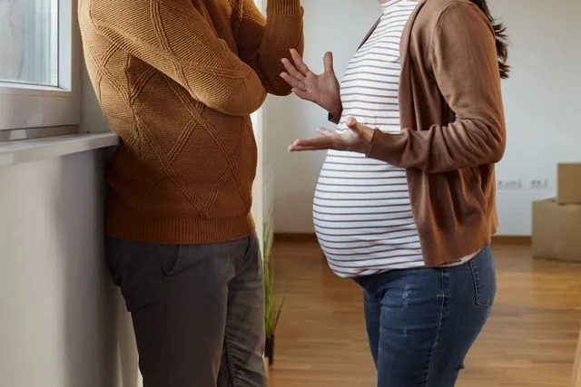 Getty Stock image of a pregnant woman arguing with her male partner