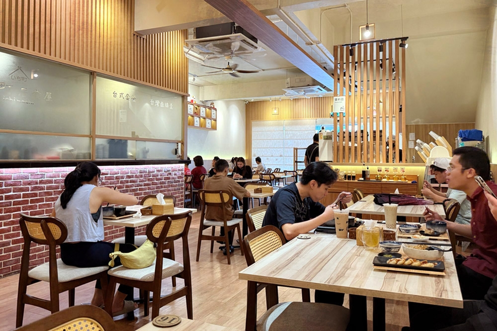 Inside the restaurant, pale woods soften the light. — Picture by CK Lim