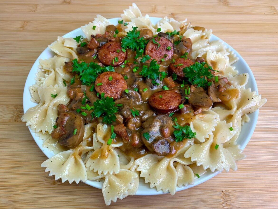 Spicy Cajun Sausage with Mushroom Sauce on Farfalle