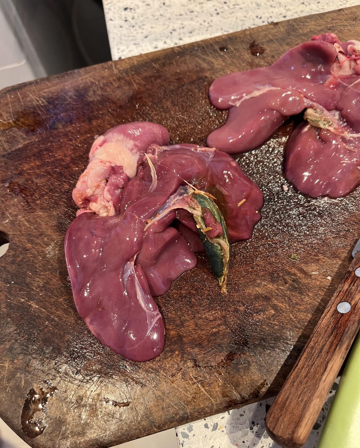 Green "bag" next to the liver of a pastoral chicken