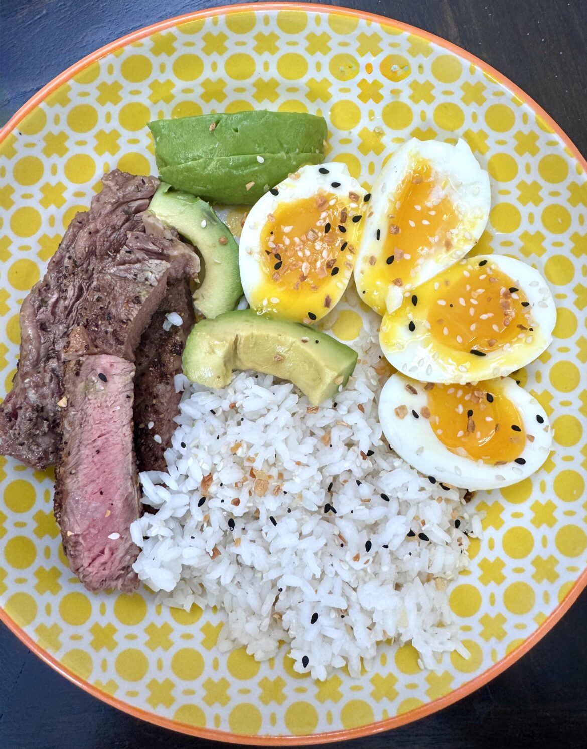 Steak, soft boiled eggs, avocado & rice