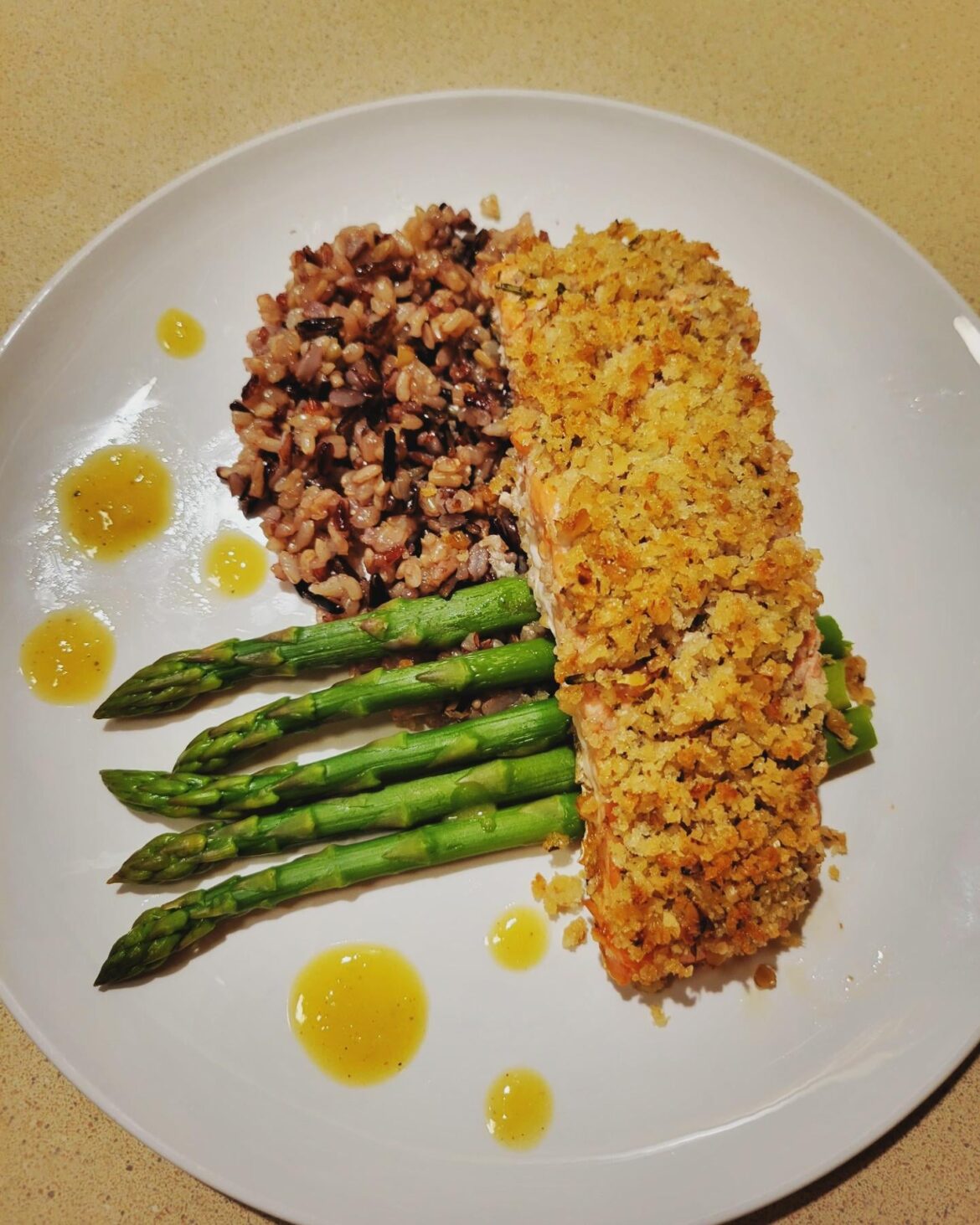 Walnut crusted salmon, wild rice, asparagus and shallot dressing. https://cuisinewithme.com/walnut-crusted-salmon-with-shallot-dressing/