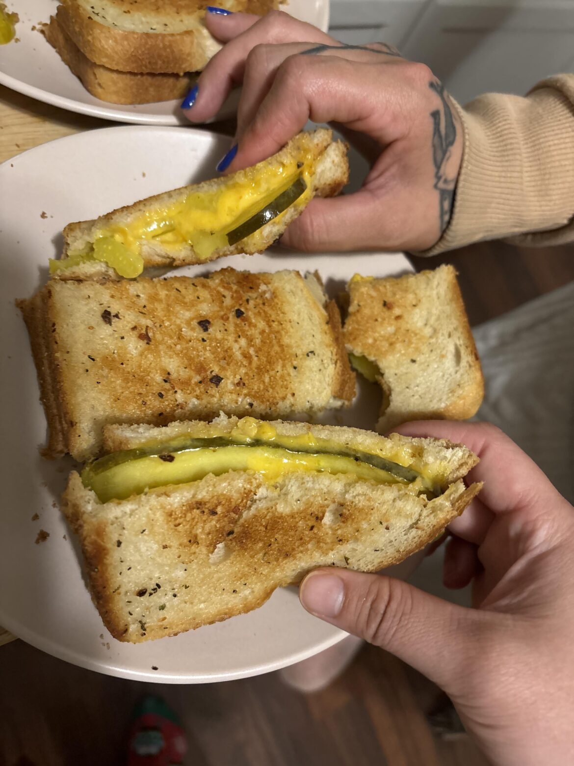 Dill Pickle/ Sweet Bread& Butter Pickle with Sharp Cheddar on Pita Bread toast with Garlic Herb butter on flat top.🥒🧀🍞🧈