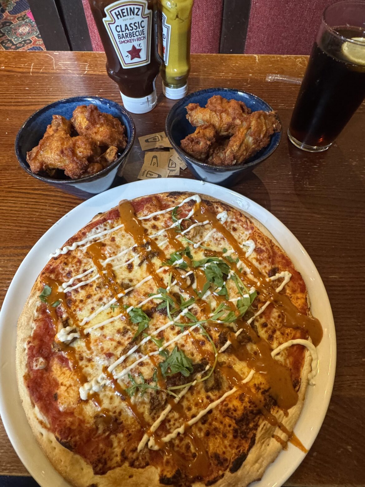 “Bangin’ wings. Pizza meh”