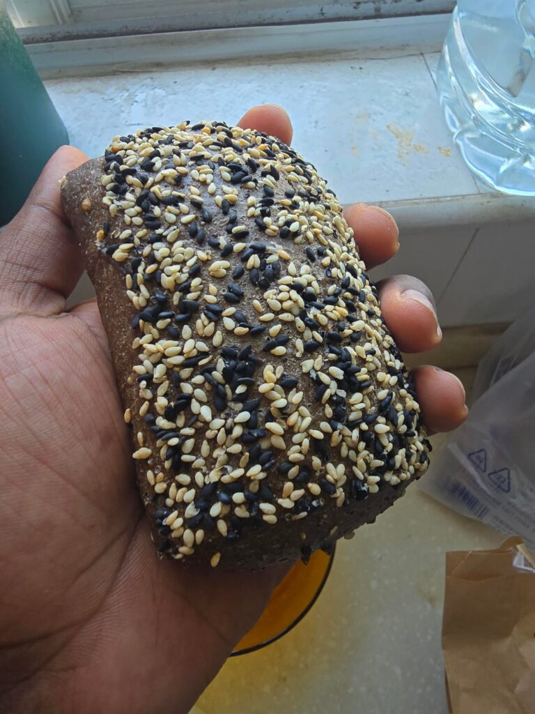 Sesame coated brown bread bun