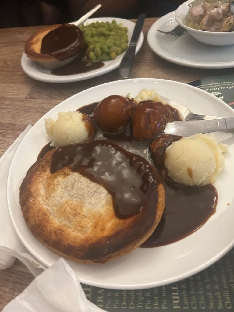 Traditional pie and double mash with gravy, rhubarb crumble and custard for dessert.
