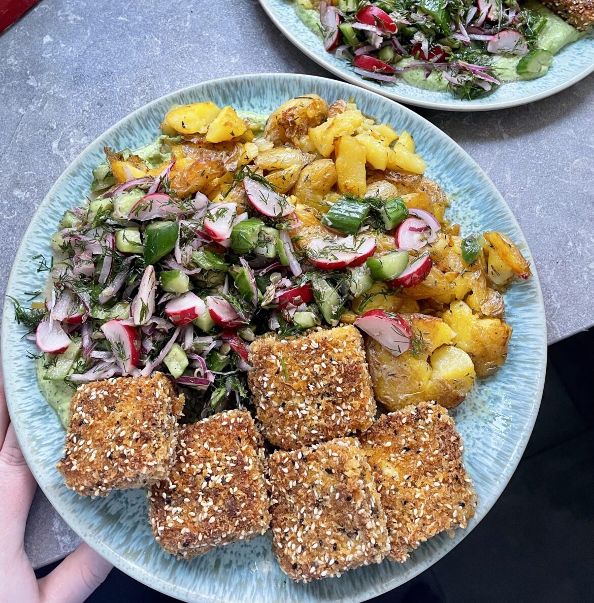 Smashed potatoes, herby green sauce, pickle salad and panko crusted tofu