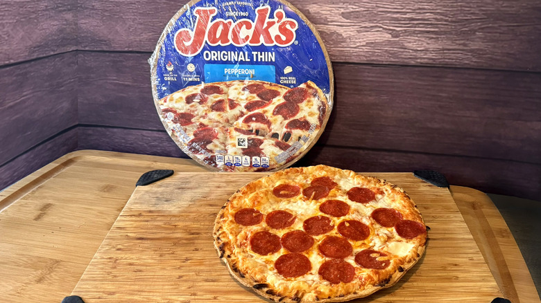 jack's pepperoni pizza on cutting board with packaging