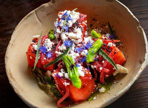 Watermelon, shishitos, feta, urfa and black lime from Street Social....
