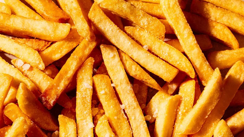 Extra-crispy fries filling the entire frame of an image