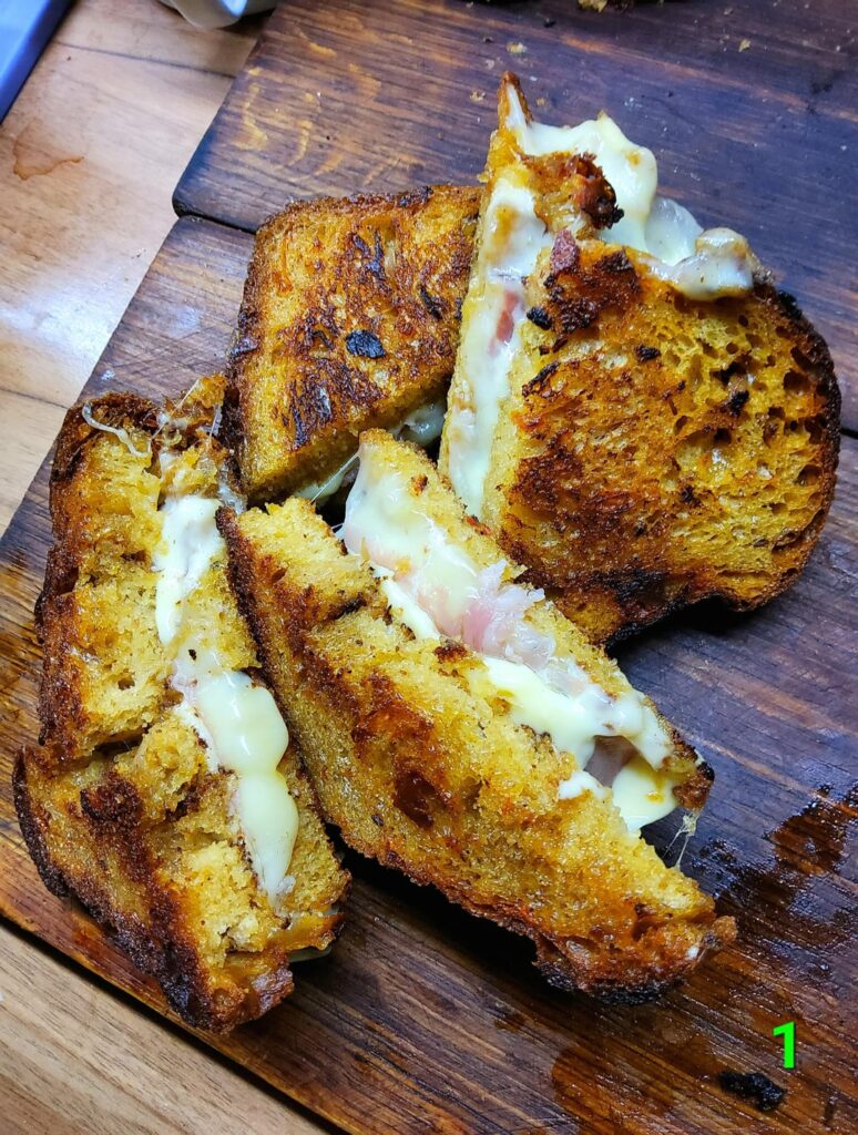 Grilled sourdough* gouda/mozzarella and Black Forrest ham sandwiches Grilled sourdough* gouda/mozzarella and Black Forrest ham sandwiches