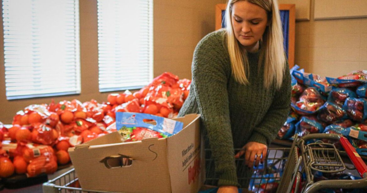 Osky Rotary Club packs Christmas meals for families in need | Local News Osky Rotary Club packs Christmas meals for families in need | Local News