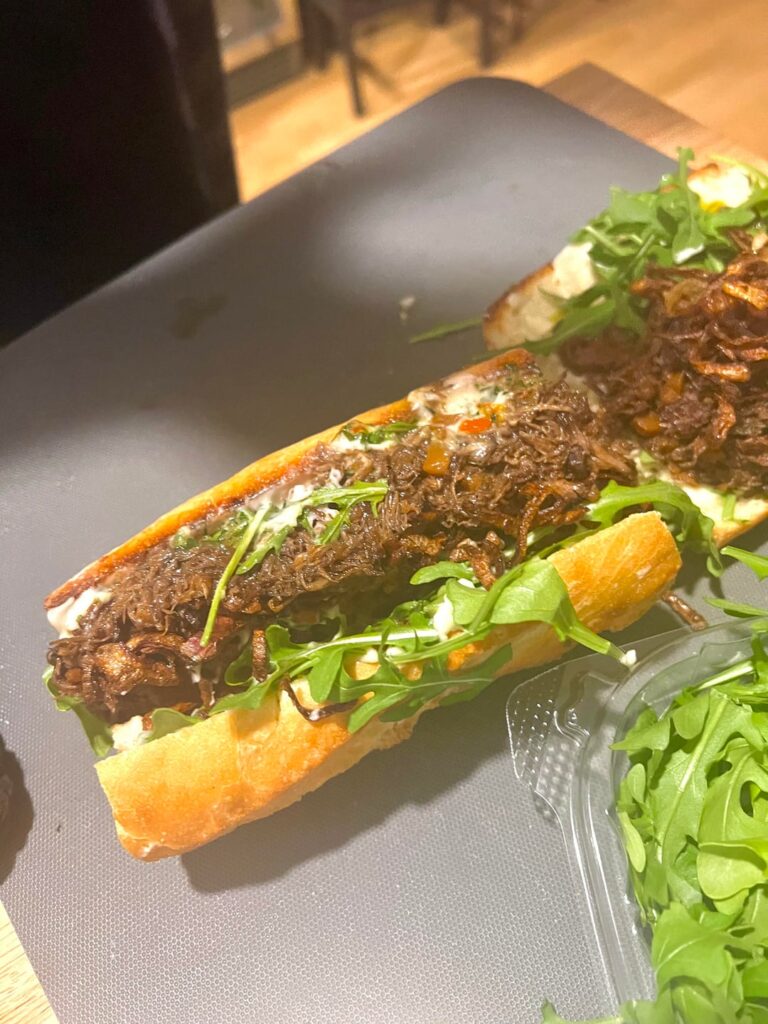[homemade] Braised short rib sandwich w/ Parm&Cheddar whiz, Basil&Parsley&Peppadew chimichurri, fried shallots and arugula