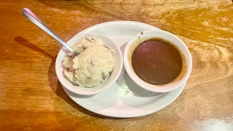 Texas Roadhouse's Mashed Potatoes with side of brown gravy