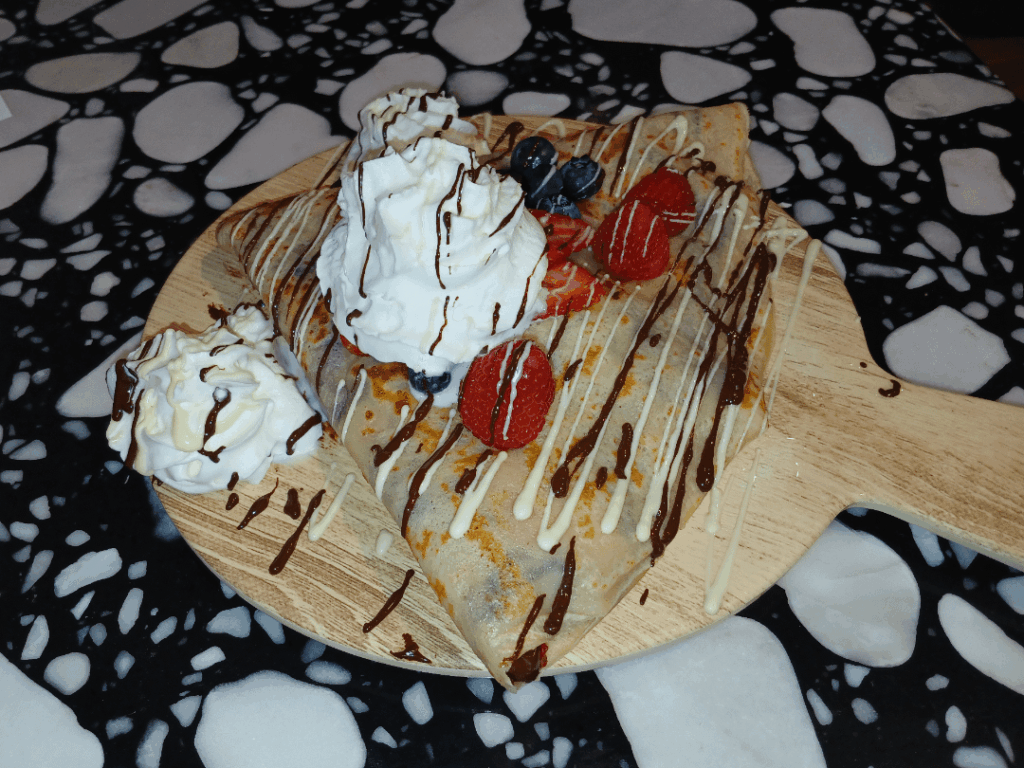 Crepe board. Yes, the whipped cream got on the table