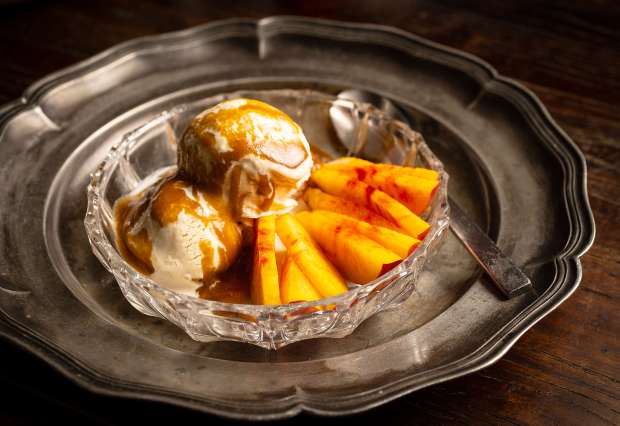 Fresh Nectarines with Straus vanilla ice cream, and a peach...