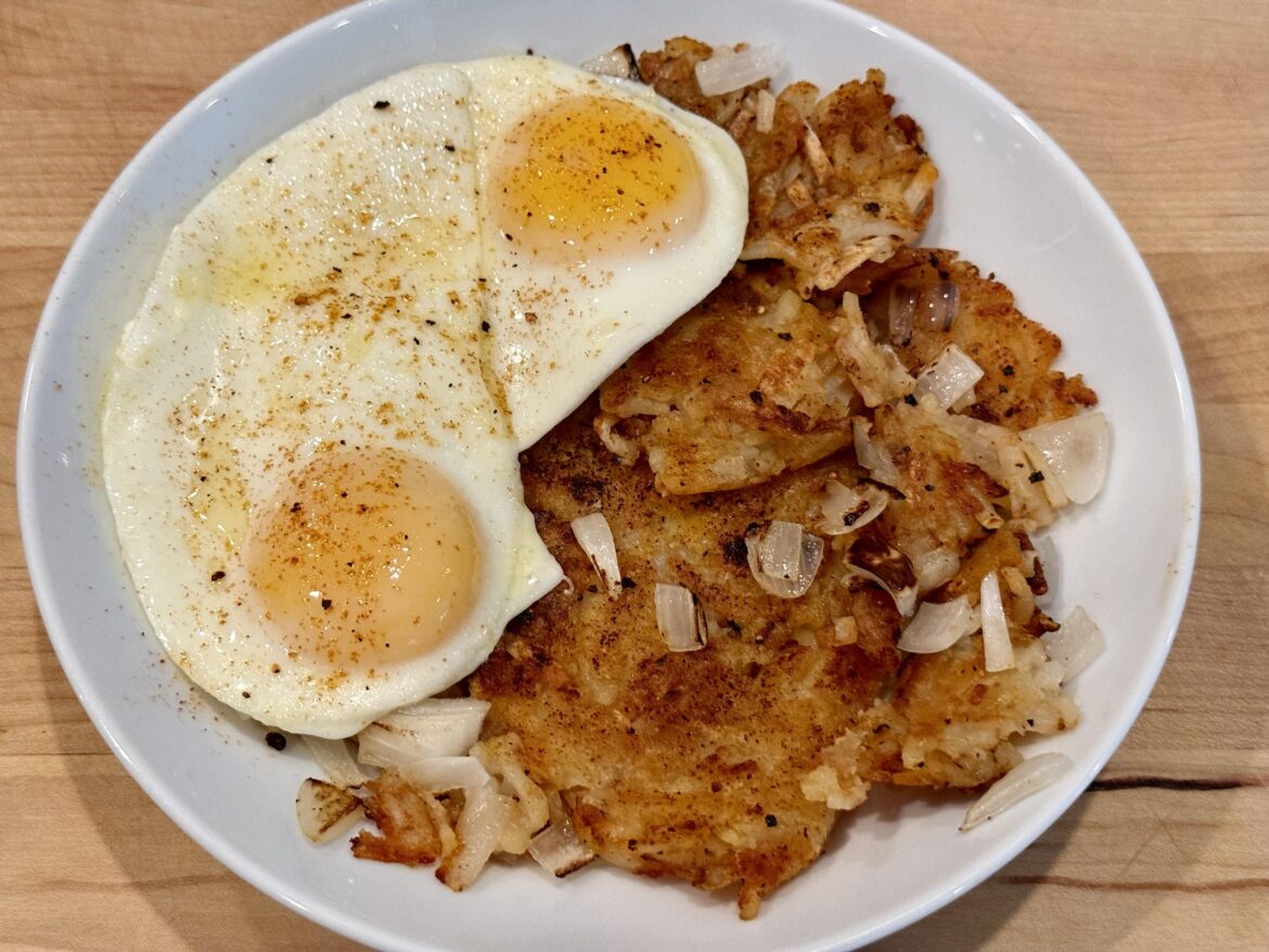 Creole Hash Browns with Grilled Onions & Eggs