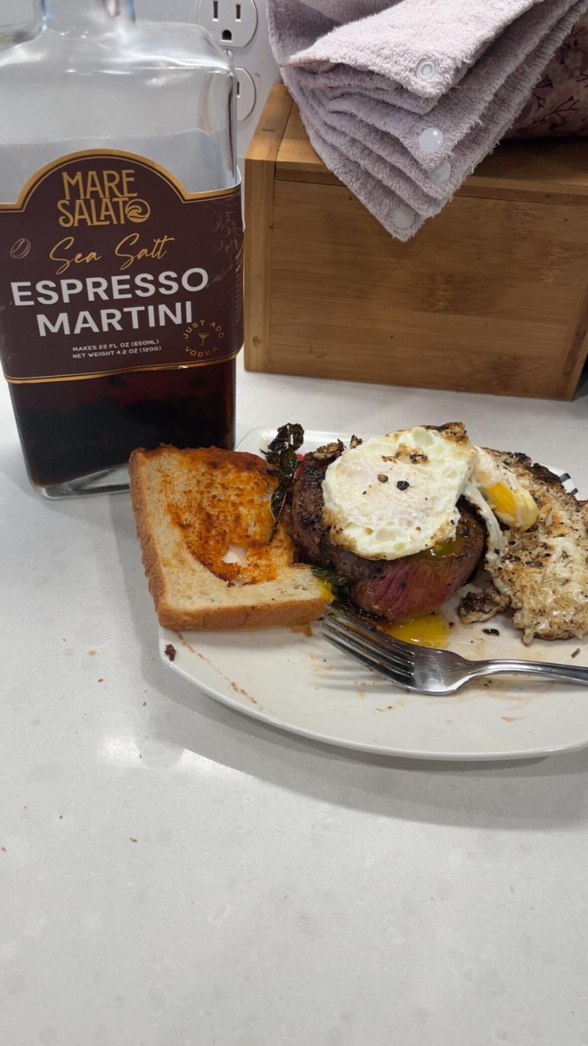 Steak, eggs and straight swigs from this espresso martini bottle