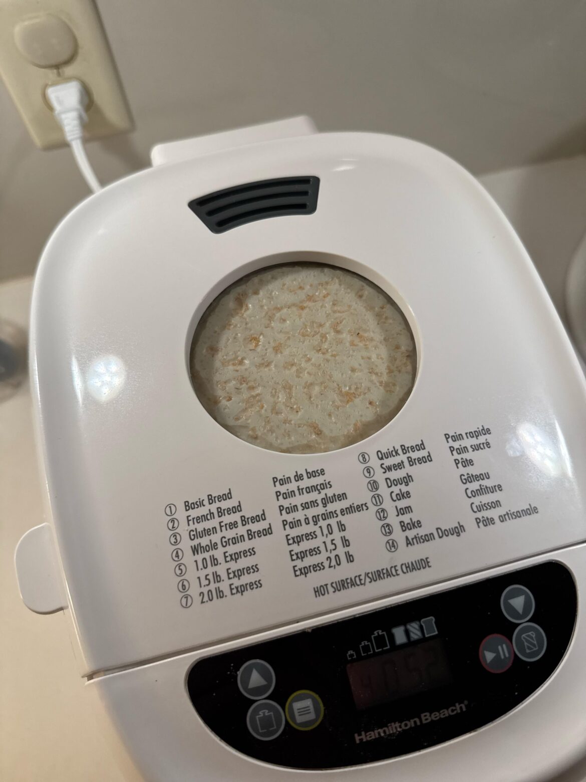 First time breaking bread. Should the bread be touching and pushing up against the top like this?